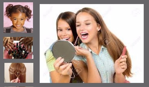 Two girls are smiling and one is holding a mirror.